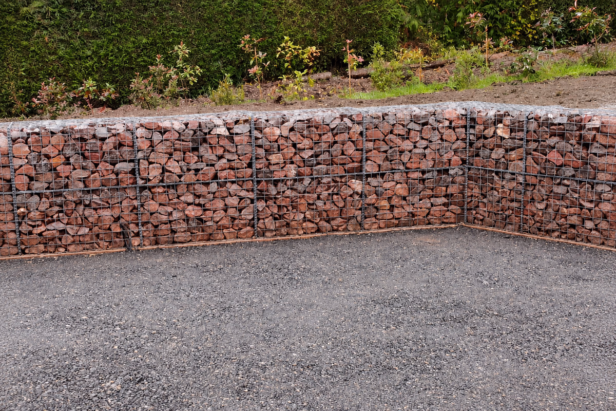 Finished gabion basket wall around a gravel base